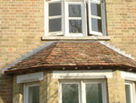 Hand made clay tile roofing in the New Forest from Harris Roofing Limited.