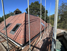 Reroofing with handmade tiles
