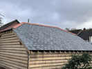 Reroofing with handmade tiles
