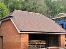 Machine made clay tile double garage roofing with hand made effect from Harris Roofing Limited.