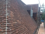Hand made clay tile roofing in the New Forest from Harris Roofing Limited.