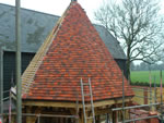 Hand made clay tile roofing in the New Forest from Harris Roofing Limited.