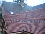 Hand made clay tile roofing in the New Forest from Harris Roofing Limited.