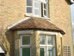 Hand made clay tile roofing in the New Forest from Harris Roofing Limited.