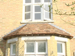 Hand made clay tile roofing in the New Forest from Harris Roofing Limited.