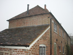 Hand made clay tile roofing in the New Forest from Harris Roofing Limited.