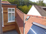 Machine made clay tile roofing with hand made effect from Harris Roofing Limited.