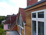 Machine made clay tile roofing with hand made effect from Harris Roofing Limited.