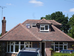 Machine made clay tile roofing with hand made effect from Harris Roofing Limited.