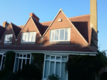 Machine made clay tile roofing with hand made effect from Harris Roofing Limited.