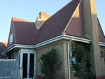 Machine made clay tile roofing with hand made effect from Harris Roofing Limited.