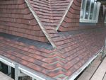 Machine made clay tile roofing with hand made effect from Harris Roofing Limited.