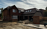 Machine made clay tile roofing with hand made effect from Harris Roofing Limited.