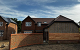 Machine made clay tile roofing with hand made effect from Harris Roofing Limited.