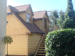 Machine made clay tile roofing in the New Forest from Harris Roofing Limited.