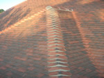 Machine made clay tile roofing in the New Forest from Harris Roofing Limited.