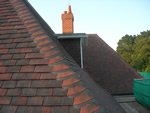 Machine made clay tile roofing in the New Forest from Harris Roofing Limited.