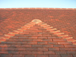 Machine made clay tile roofing in the New Forest from Harris Roofing Limited.