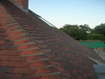Machine made clay tile roofing in the New Forest from Harris Roofing Limited.