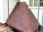 Machine made clay tile roofing in the New Forest from Harris Roofing Limited.