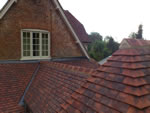 Machine made clay tile roofing in the New Forest from Harris Roofing Limited.