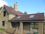 Machine made clay tile roofing in the New Forest from Harris Roofing Limited.