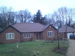 Machine made clay tile roofing in the New Forest from Harris Roofing Limited.
