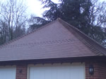 Machine made clay tile roofing in the New Forest from Harris Roofing Limited.