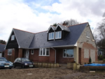 Man made slate tiling in the New Forest from Harris Roofing Limited.