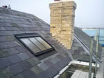 Natural slate tiling in the New Forest from Harris Roofing Limited.