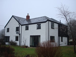 Reroofing with natural slate tiles throughout the New Forest from Harris Roofing Limited.