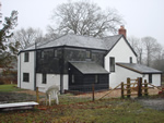 Reroofing with natural slate tiles throughout the New Forest from Harris Roofing Limited.