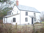Reroofing with natural slate tiles throughout the New Forest from Harris Roofing Limited.