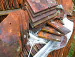 Yard stored tiles in the New Forest from Harris Roofing Limited.
