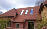 New handmade tiles fitted to new build house