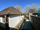Reroofing with handmade tiles
