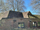 Reroofing with handmade tiles