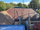Reroofing with handmade tiles