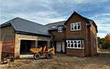 New slate tiles fitted to new build house