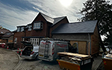New slate tiles fitted to new build house