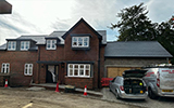 New slate tiles fitted to new build house