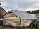 Reroofing with handmade tiles