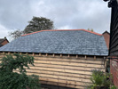 Reroofing with handmade tiles