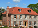 Completed roof with lead works in the New Forest by Harris Roofing Limited